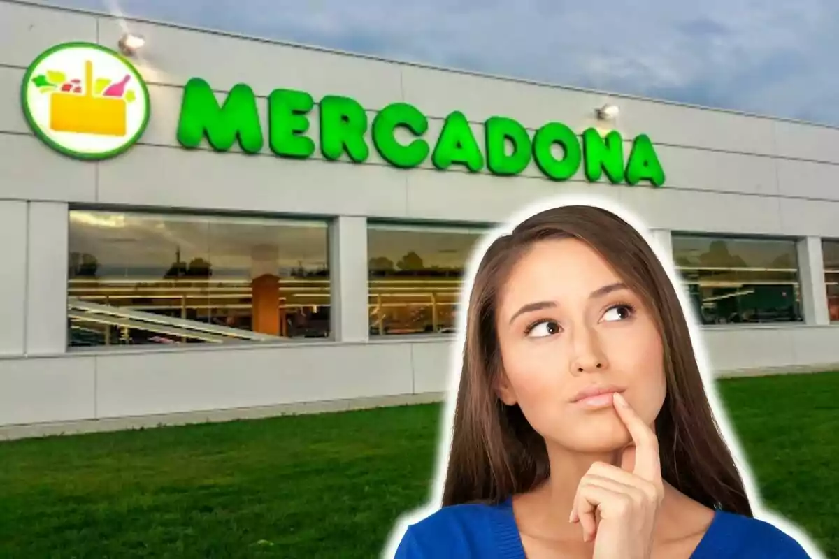 Mujer pensativa frente a una tienda de Mercadona.